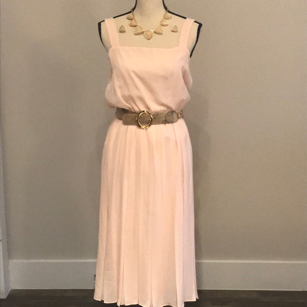 A blush sleeveless dress